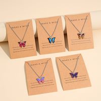 Collier chaîne à maillons papillon coloré en alliage style bohème avec pendentif dégradé pour femme