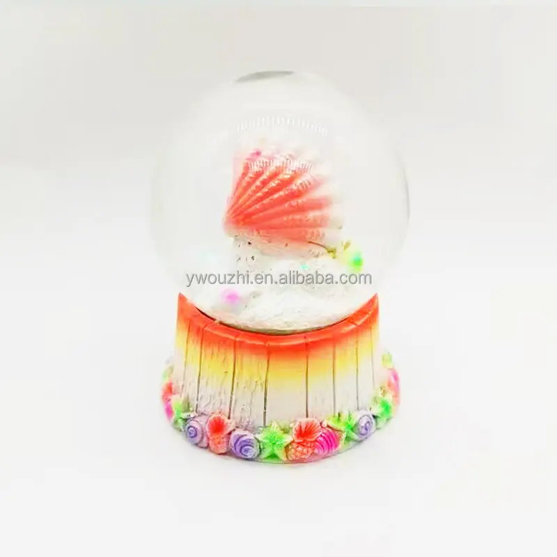 Grosir Souvenir Pantai Bola Salju Desain Baru Ornamen Resin Globe Air Glitter Shell Bentuk Polyresin Snowglobe