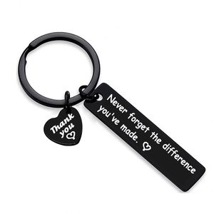 Porte-clés en acier inoxydable noir avec inscription « Que vous soyez fière de votre travail », idéal comme cadeau de retraite - Product Image 4