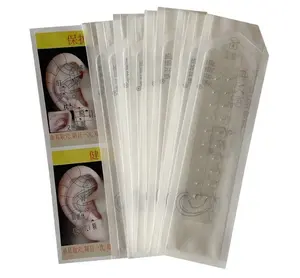 Zhong Hua Er Tie Plester Telinga Magnetik, Benih Emas untuk Terapi Akupuntur Aurikular Telinga - Product Image 1