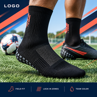 Chaussettes de football noires renforcées à profil mince, avec empeigne en maille respirante et antidérapante pour une adhérence optimale sur le terrain, et tableau de tailles pour crampons.