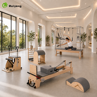 Vente directe usine : Reformer Pilates 5 pièces en chêne, durable, personnalisable, de haute qualité, écologique et réglable, pour studio de Pilates et de yoga, en gros.