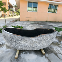 Baignoire d'angle autoportante de luxe en marbre noir foncé irrégulier, en pierre naturelle, pour hôtel et maison, style béton, vente en gros
