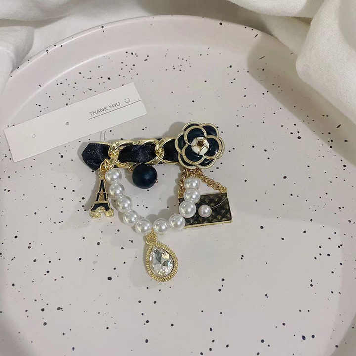 suits-clothes-accessories-fashion-jewelry-broche-pins-women-black