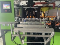Máquina de soplado de botellas PET 5000BPH automática de 4 cavidades para botellas de plástico
