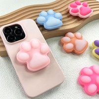 Support de téléphone portable en silicone souple et mignon, design chat, portable, pour bureau et lit, avec fonction béquille mains libres, compatible 4-8 pouces