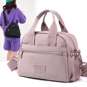 2023 नई देवियों कंधे बैग बड़ी क्षमता हैंडबैग नायलॉन हैंडबैग उच्च गुणवत्ता दूत बैग