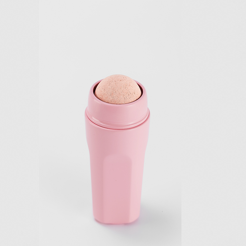 Trendy oil-absorbing volcanic stone face roller cosmetic tool customized logo color volcanic rock oil absorbing roller pink
