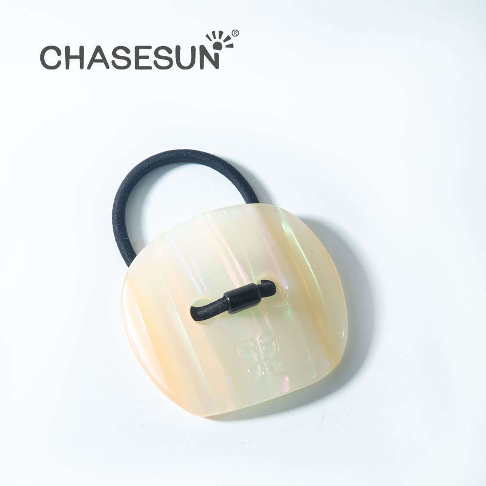Élastique à cheveux boutonné blanc polarisé couleur coquillage