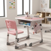 Ensemble bureau et chaise réglables en hauteur pour enfants avec structure métallique incurvée et compartiment de rangement ouvert pour la maison et l'école