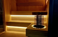 Sauna en bois massif gris foncé écologique avec porte coulissante, sièges à plusieurs niveaux, design moderne pour usage commercial