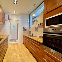 Vente en gros d'appartement personnalisés Forme d'une ligne Armoire de cuisine en acier inoxydable 304 Armoire de cuisine multifonctionnelle Casiers intégrés