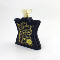Flacon de parfum à tête pompe en forme d'étoile à cinq branches, au design original et unique, avec corps de flacon estampé or, pour les créateurs de tendances