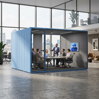 Studio de conférence préfabriqué moderne, modulaire, intelligent, avec vidéoconférence intégrée, réduction du bruit multi-personnes et isolation acoustique.