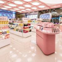 Ensemble de meubles de présentation pour magasin de cosmétiques personnalisés, kiosque rond rose pour la présentation des rouges à lèvres, décoration intérieure pour boutique de maquillage
