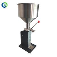 Machine manuelle de remplissage et d'étiquetage de pots en verre de 200 ml pour beurre de cacahuète, miel, crème, mélasse et confiture
