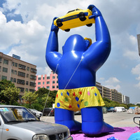 Modèle de gorille bleu gonflable géant avec accessoire de voiture - Figurine gonflable publicitaire personnalisée pour les promotions de vente automobile