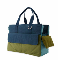 Sac de transport portable en nylon pour animaux de compagnie avec coussin amovible et clip de sécurité, côtés extensibles pour chats et petits chiens, idéal pour les voyages de week-end