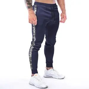 Logo personalizzato all'ingrosso abbigliamento sportivo da uomo palestra Slim Fit canotta allenamento pantaloni da jogging in poliestere traspirante abbigliamento da allenamento per uomo