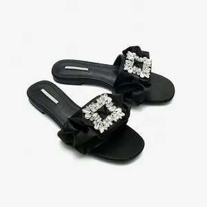 Sandalias planas con hebilla para el sol para mujer, sandalias a la moda con lazo de diamantes de imitación para el hogar, novedad de verano de 2022