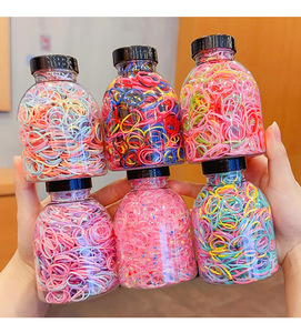 Venta al por mayor 1000 unids/caja de goma de Color caramelo lazos para el cabello <span class=keywords><strong>mujeres</strong></span> niñas bandas elásticas para el cabello <span class=keywords><strong>en</strong></span> botella de plástico lindos accesorios para el cabello - Product Image 2