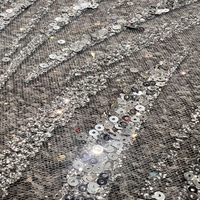 Tissu de dentelle en mousse à paillettes blanches pour la fabrication de robes de soirée fines