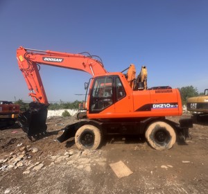 รถขุดล้อยางมือสอง Doosan DH210W-7 ขนาด 21 ตัน พร้อมใบมีด รถขุด Doosan DH210W DH210W-7 มือสอง ราคาถูก - Product Image 1