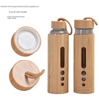 Botol air Logo kustom grosir botol air kaca cangkang bambu ramah lingkungan botol air rumah kantor dengan tali tangan