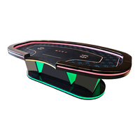 Table de poker Texas personnalisée YH OEM avec piétement en forme de W, tapis noir, éclairage LED cyan, rail en cuir magenta lumineux, style casino