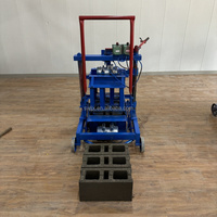 Machine de fabrication de blocs mobile QMJ2-45, haute efficacité pour la production mobile, machine à briques à opération facile