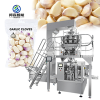 Machine automatique pour le conditionnement de l'ail, des pruneaux de Californie séchés, des raisins secs, des jujubes, des graines de tournesol en sachets stand-up, sachets préformés, doypacks et sachets en aluminium pour granulés