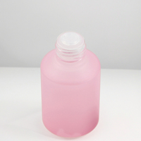 Fuyun Bouteille en verre pour soins de la peau en petite quantité 15ml/30ml/60ml/125ml/200ml Bouchon à vis noir en forme de cylindre rose mat pour l'utilisation de tampons