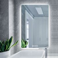 Miroir de salle de bain LED à bords doux avec rétroéclairage, affichage de l'heure et commande tactile pour hôtel, salle de maquillage, vente en gros