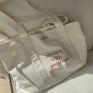 กระเป๋าผ้าแคนวาสแบบขายส่ง ใช้ซ้ำได้ มีช่องซิป ปิดผนึกได้ พิมพ์โลโก้ตามสั่ง กระเป๋าช้อปปิ้งแฟชั่นสำหรับผู้หญิง - Product Image 6