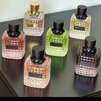 Flacon en verre 100 ml pour parfum avec bouchon doré et emballage boîte pour le stockage de parfums