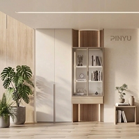 Armoire de chambre murale complète en panneaux plats symétriques encastrés, avec rangement pour service à thé et grille de rangement décorative, couleur crème