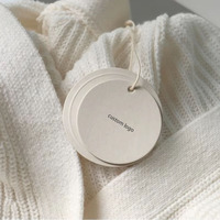 Étiquettes volantes de vêtements avec logo personnalisé en gros étiquettes pivotantes circulaires blanches pour sacs vêtements chaussures impression papier spéciale