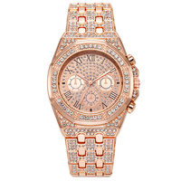 Montre-bracelet à quartz tendance avec bracelet en acier ciel étoilé, entièrement incrustée de diamants et chiffres romains, pour hommes et femmes