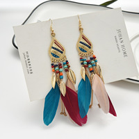 Gland balancent longues boucles d'oreilles bohème feuille plume boucles d'oreilles en forme d'éventail frangé plume graine perlée boucles d'oreilles pour femme