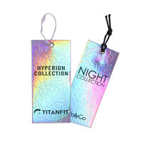 Étiquette suspendue au laser Étiquette volante Papier hologramme oscillant Forme personnalisée Papier graphique de luxe Imprimé sérigraphie Fluorescent