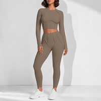 Nouvel ensemble de haut de yoga à manches longues de couleur unie, pantalon de fitness respirant, ensemble deux pièces à séchage rapide pour le Pilates