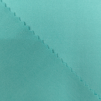 Vente en gros directe d'usine : Tissu élastique tricoté en polyester pour vêtements décontractés