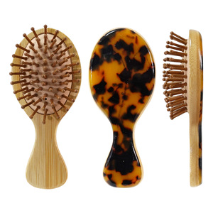 <span class=keywords><strong>แปรง</strong></span>หวีผมแบบเข็มด้ามไม้ไผ่สำหรับใช้ในบ้านหวีป้องกันไฟฟ้าสถิตย์เบาะอากาศทรงรีรีแบบ2025ใหม่ออกแบบได้ตามที่ต้องการ - Product Image 3