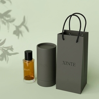 Flacon de parfum en verre cristallin avec coffret cadeau noir mat, contenant transparent brillant pour emballage de parfum de luxe