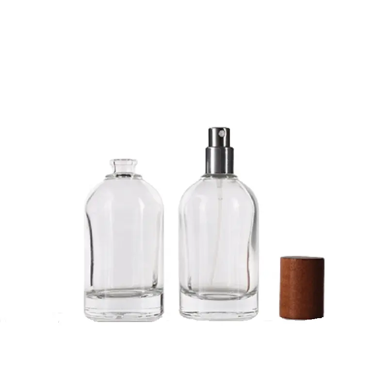उच्च अंत 50ML खाली इत्र की बोतलें सिलेंडर संगीन मुंह ग्लास इत्र की शीशी इत्र की शीशी पैकेजिंग के साथ बांस लकड़ी टोपी