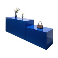 Table de présentation mobile bleue pour magasin de vêtements, idéale pour les boutiques de chaussures et sacs, et les centres commerciaux