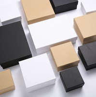 Boîte cadeau rigide en papier kraft personnalisée avec gaufrage et doublure en mousse pour l'emballage de vêtements, de chaussures, de vin et de cosmétiques