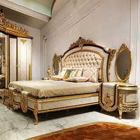 Lit en bois sculpté de style royal, finition dorée baroque, style victorien orné, cadre en bouleau massif, chambre principale