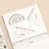 Ensemble de dessin spécial en quatre pièces: règle, règle triangulaire, rapporteur, boussole et ensemble de mesure