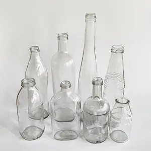 Vente en gros de bouteilles en verre transparent OEM 426ml écologiques Bouteilles de lait vides de qualité alimentaire pour boisson aux fruits